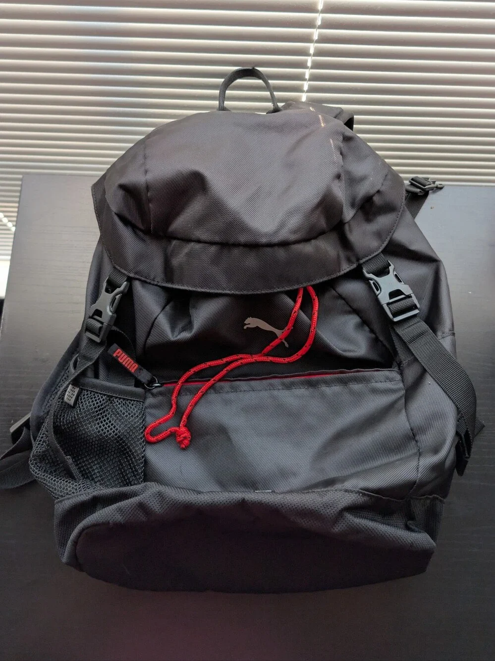 Puma Black Backpack with Drawstring And Red Accent